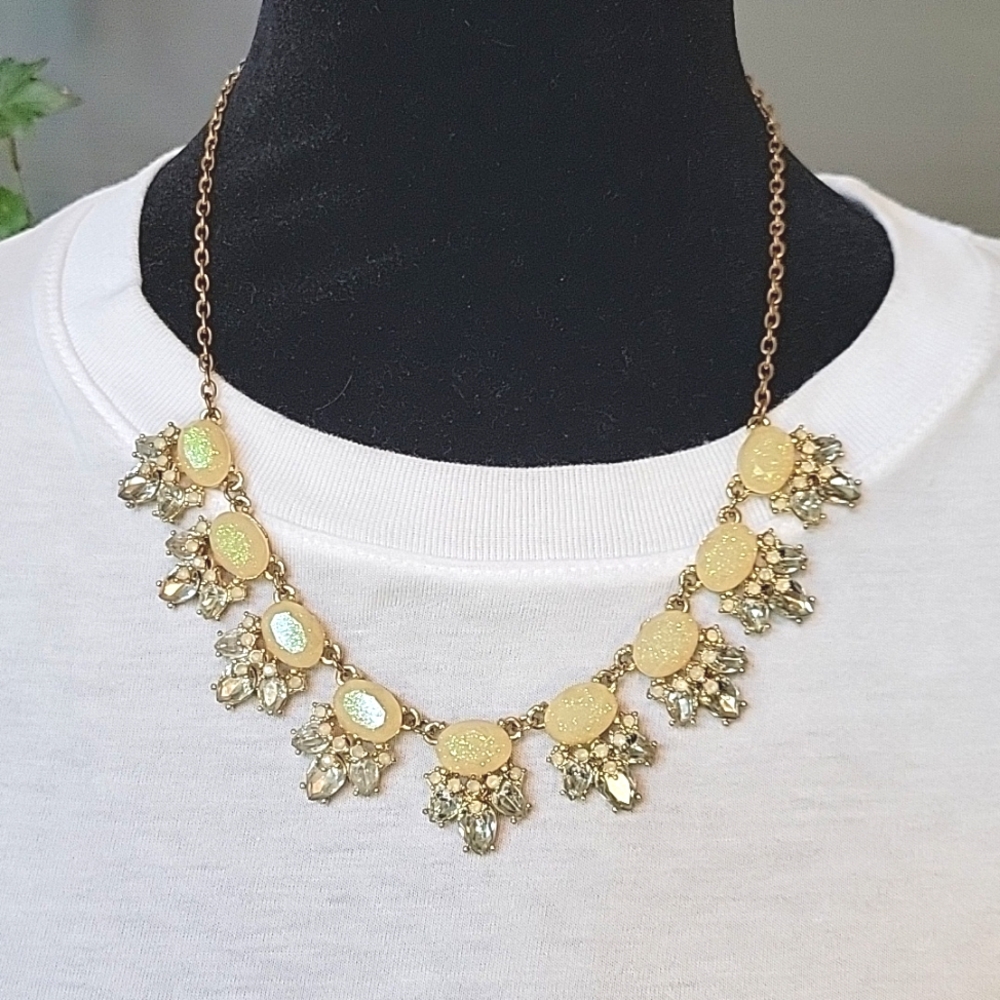Charming Charlie gold and iridescent ivory statement necklace